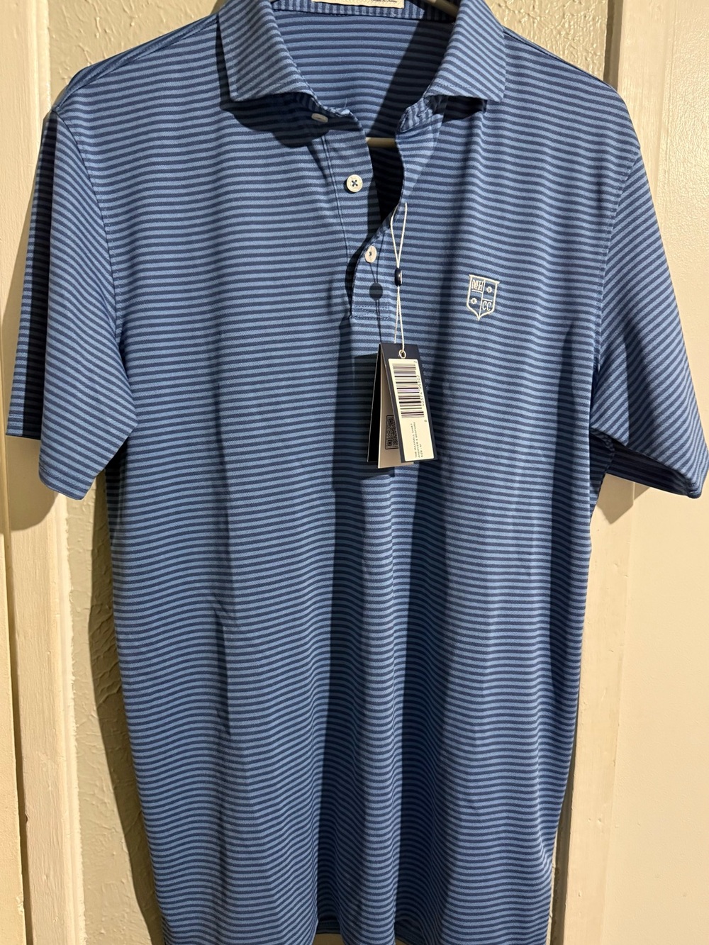 Men's Light Blue Striped Polo Shirt with Emblem